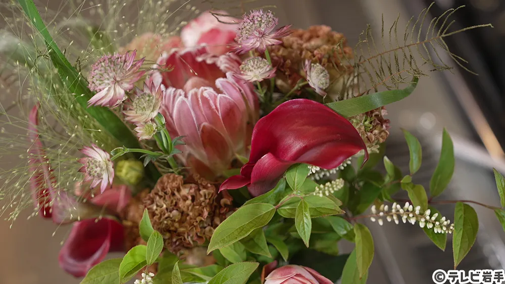 笑顔になる花を